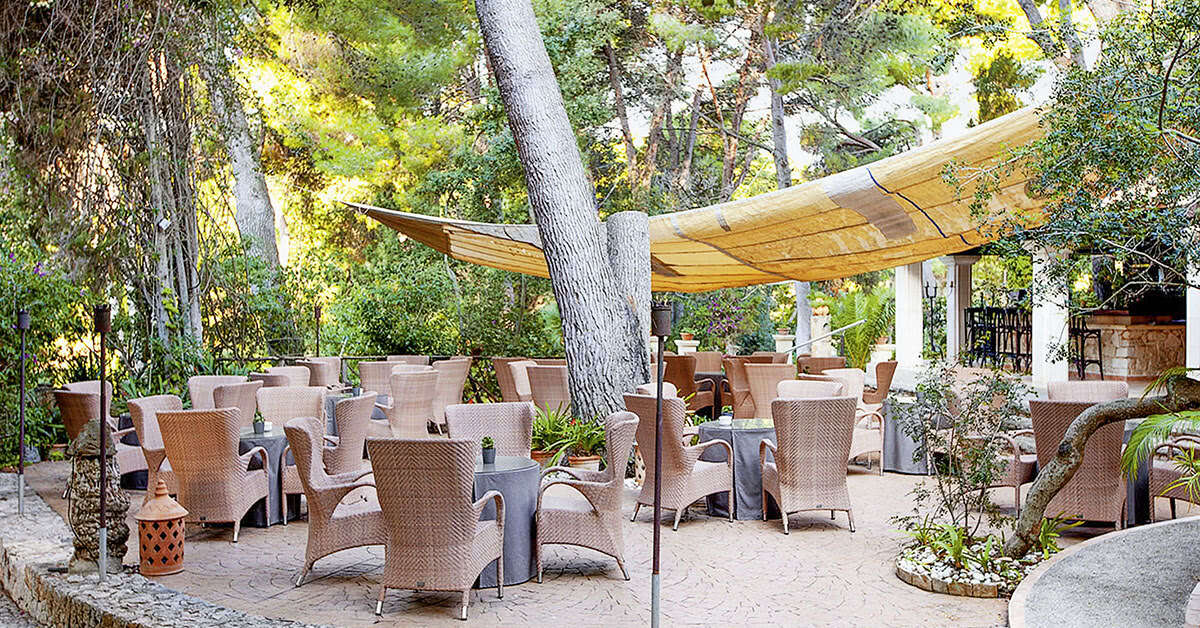 Een foto van het terras bij Hotel Lago Garden Suites & Spa