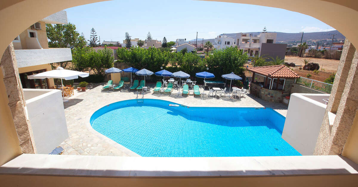 Een foto van het zwembad bij Dimitra Hotel & Appartementen Kokkini