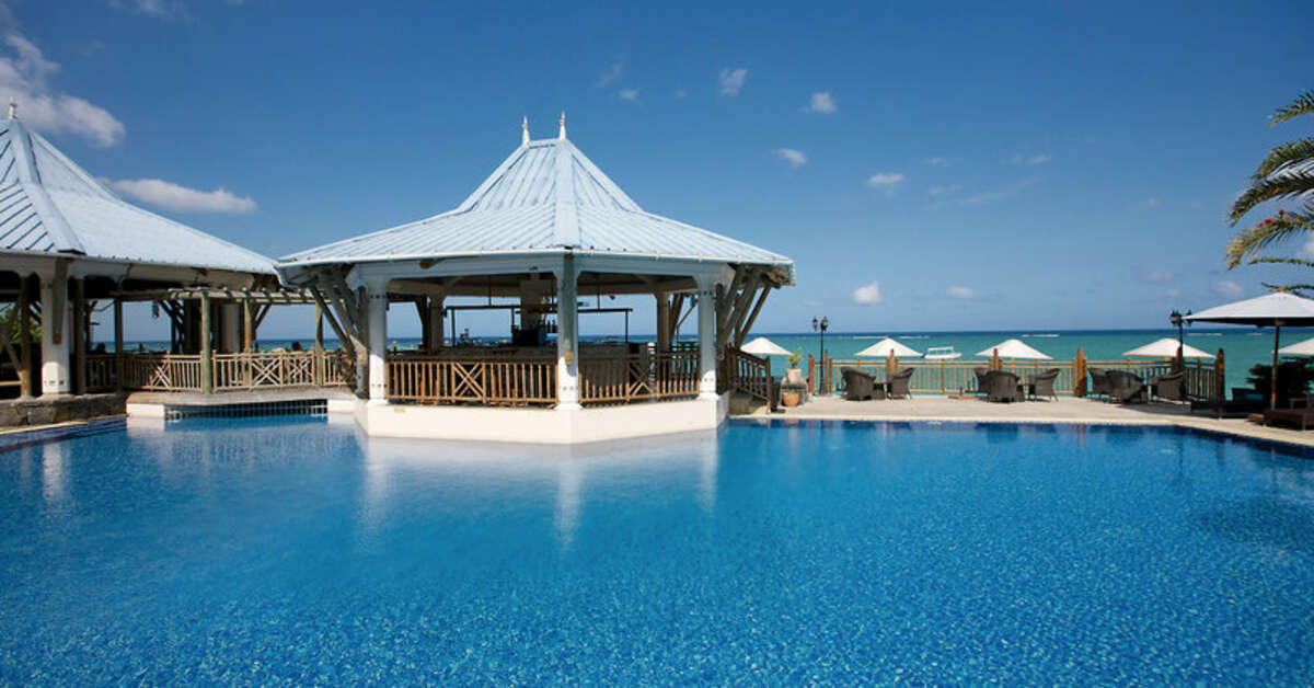 Een foto van het zwembad bij Pearle Beach Resort & Spa