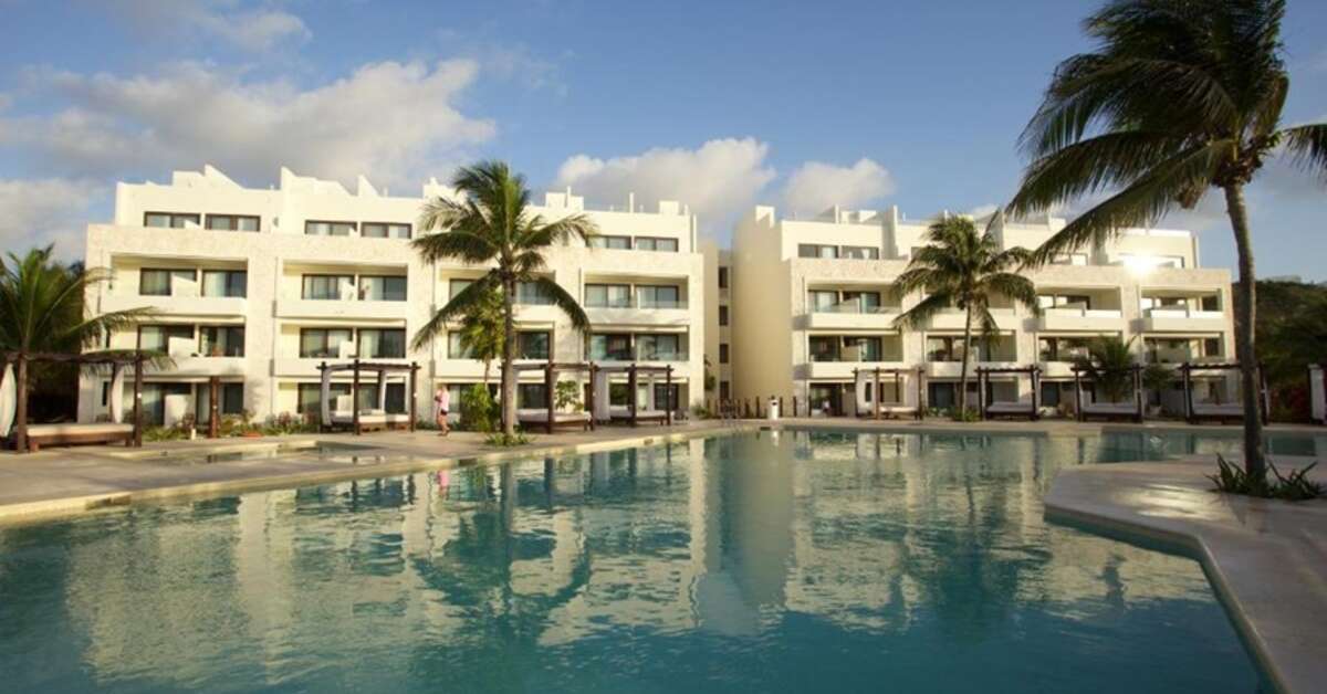 Een foto van het zwembad bij Akumal Bay Beach & Wellness Resort