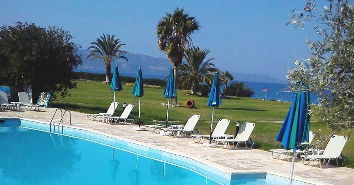 Een foto van het zwembad bij Natura Beach Hotel & Villas