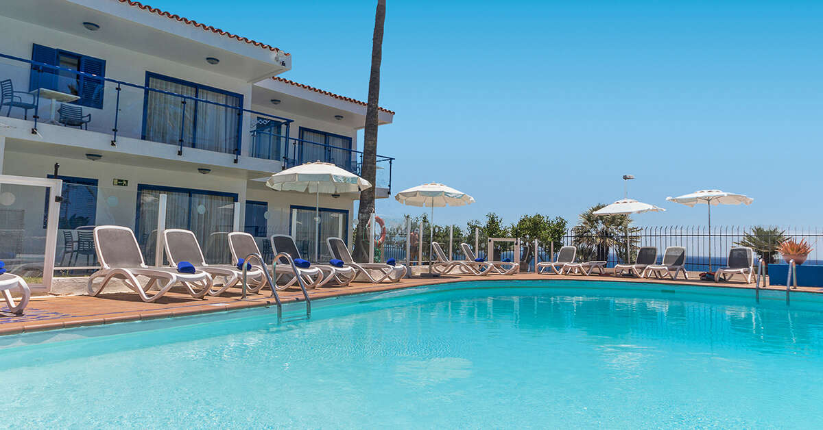 Een foto van het zwembad bij Appartementen Los Caribes I