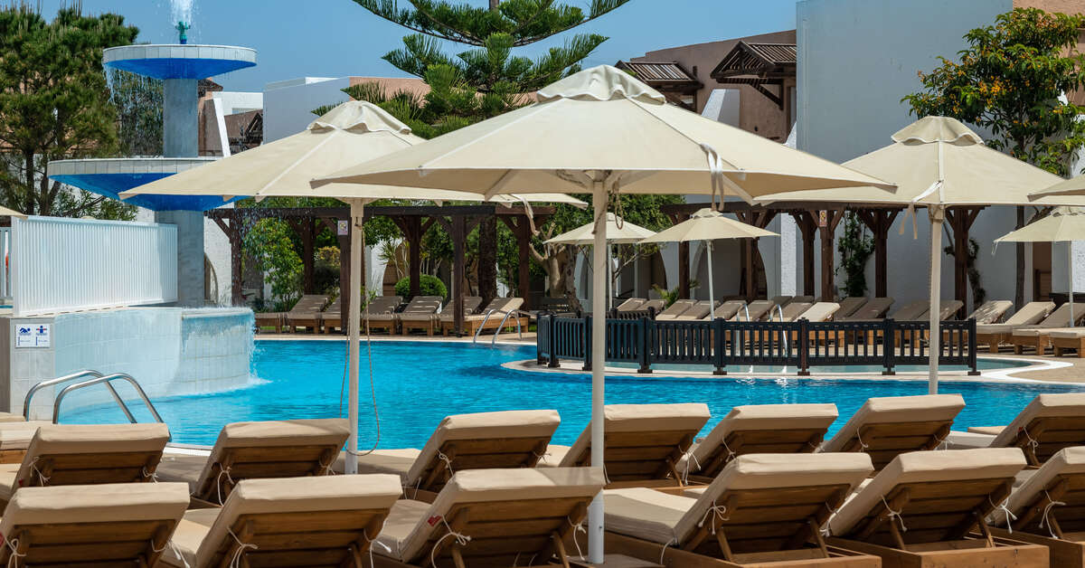 Een foto van het zwembad bij Gaia Village Hotel