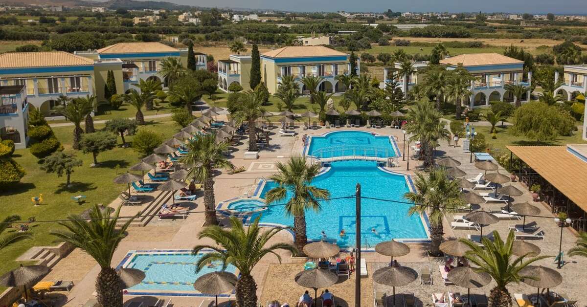 Een foto van het zwembad bij Corali Hotel & Village