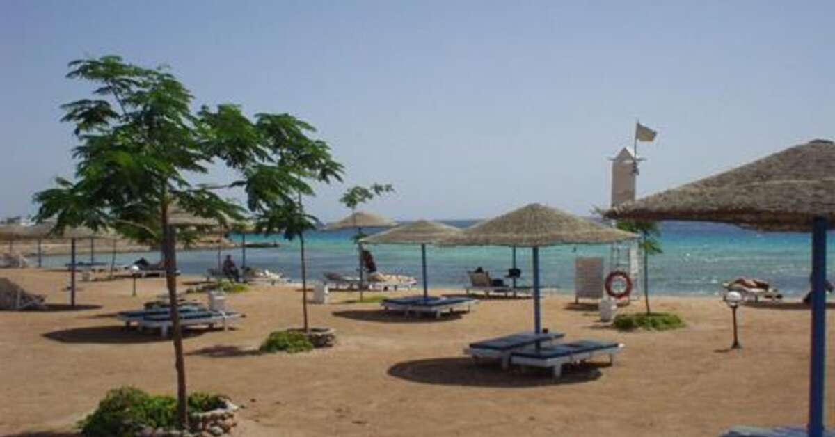 Een foto van het strand bij Sea Garden Hotel