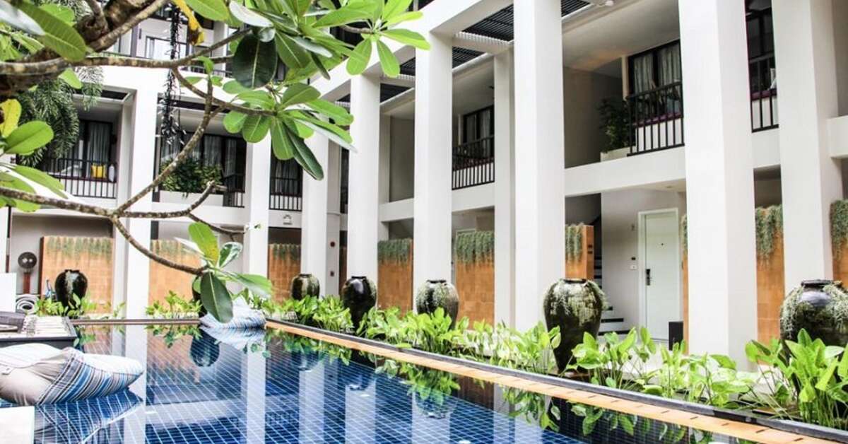 Ein Foto Outrigger Surin Beach Resort
