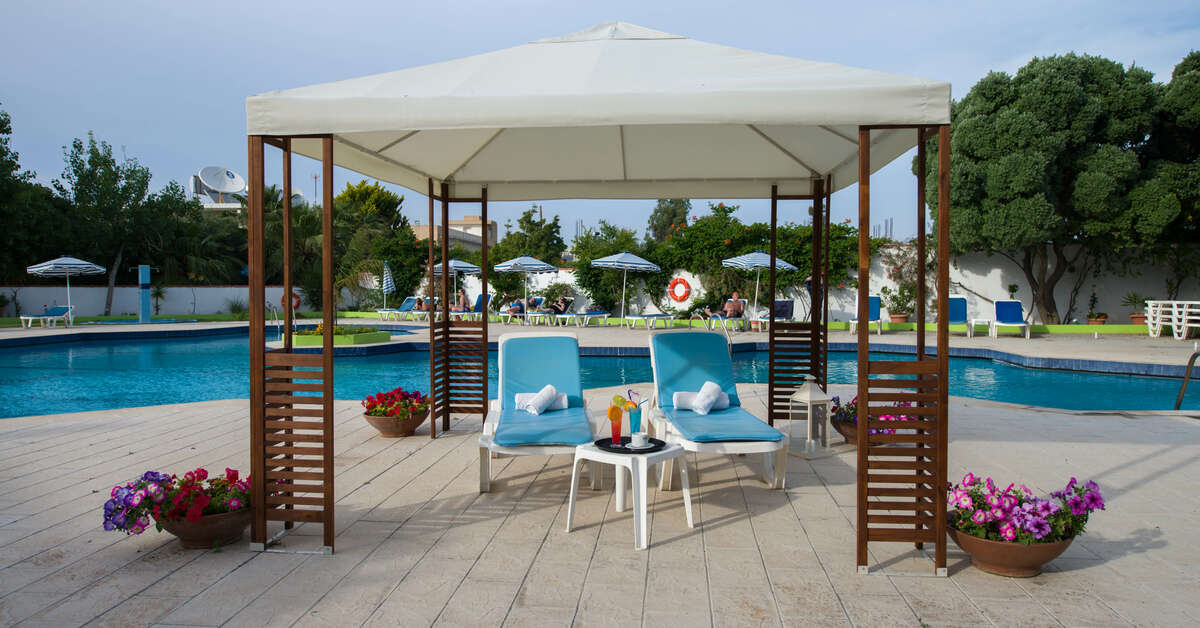 Een foto van het zwembad bij Happy Days Hotel Tholos