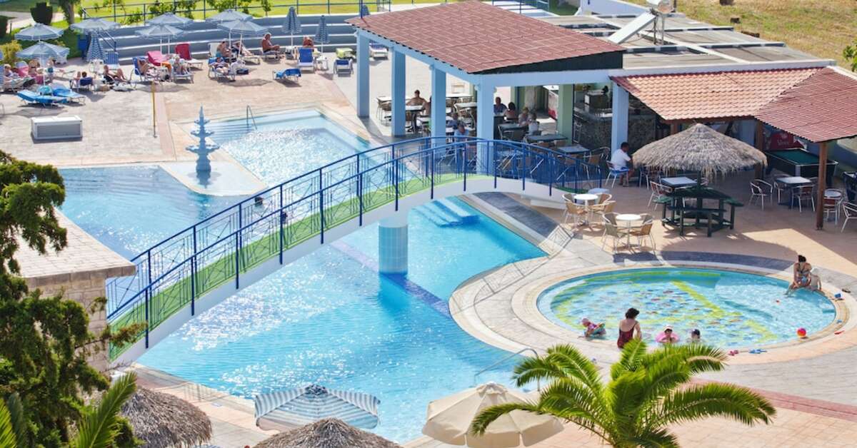 Een foto van het zwembad bij Corali Hotel & Village