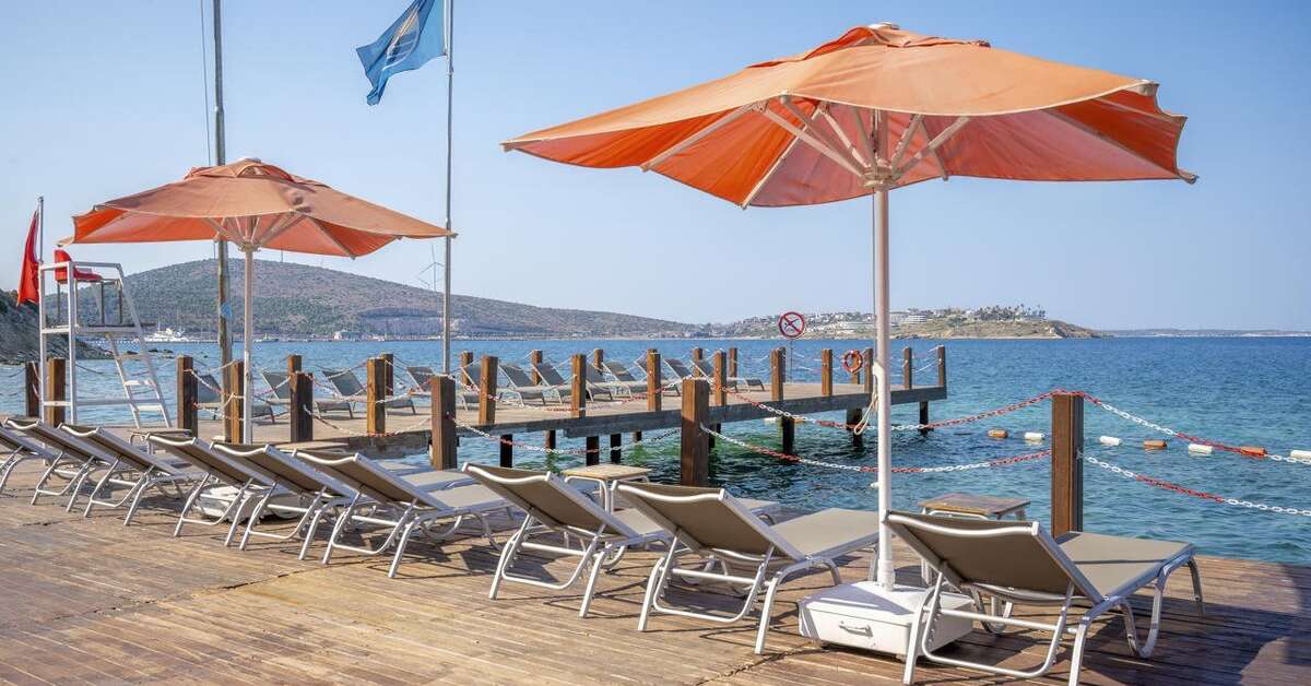 Een foto van het strand bij The Nowness Luxury Hotel & Spa