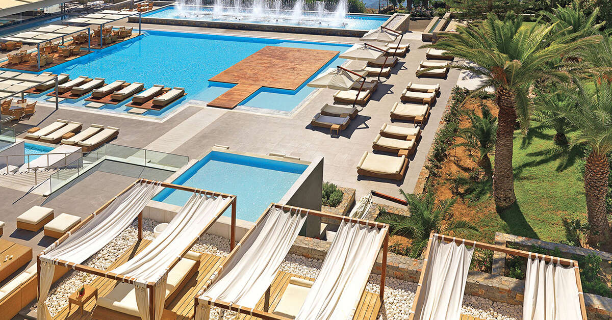 Een foto van het zwembad bij Out of the Blue Capsis Elite Resort