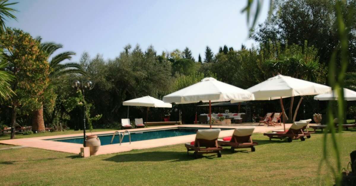 Een foto van het zwembad bij Isabella Country House