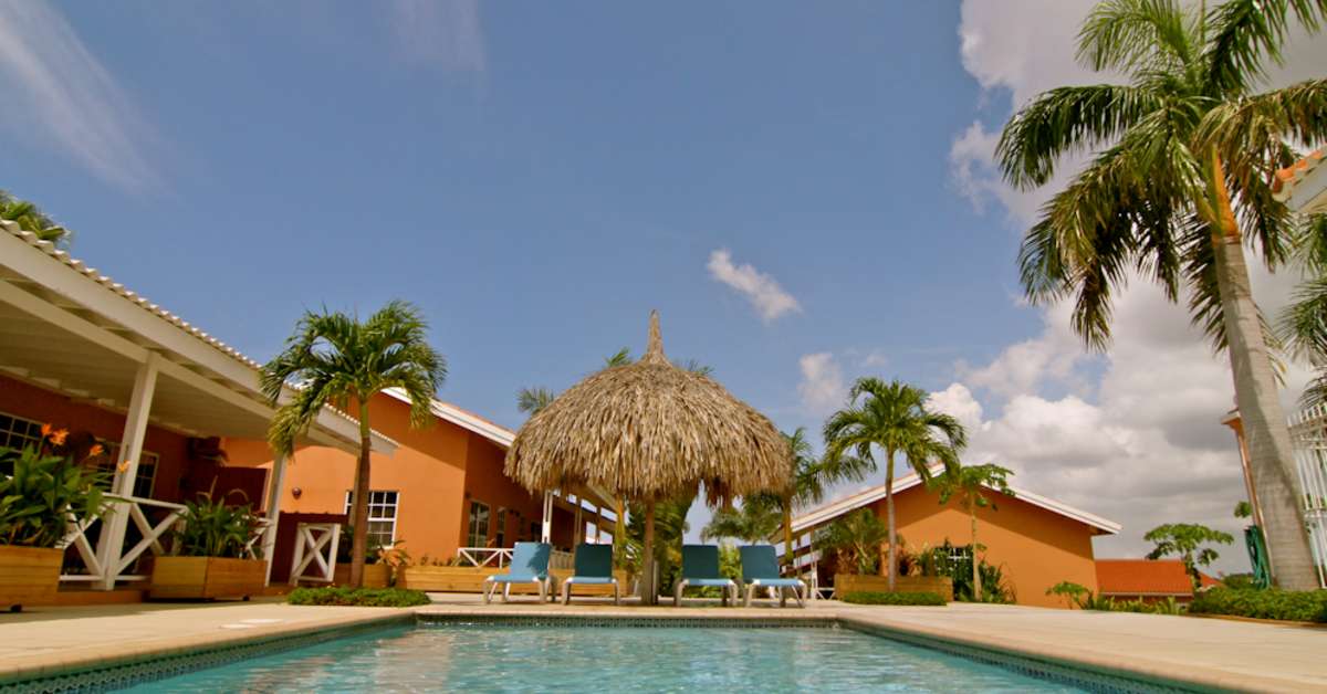 Een foto van het zwembad bij Curinjo Resort