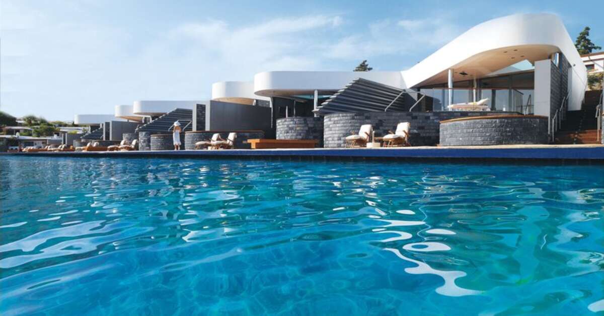 Een foto van het zwembad bij Elounda Beach Hotel & Villas
