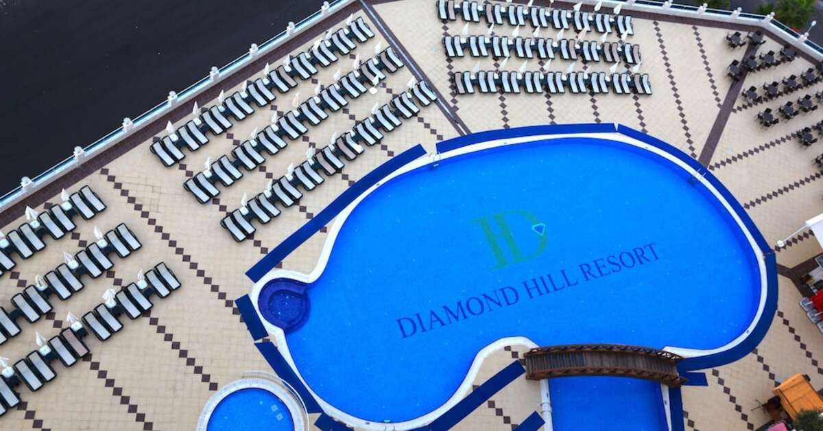 Een foto van het zwembad bij Diamond Resort & Spa