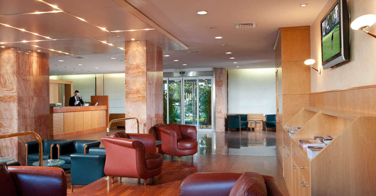 Een foto van het interieur van Hotel Raffaello Milaan