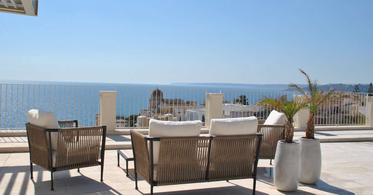 Een foto van het terras bij Est Hotel