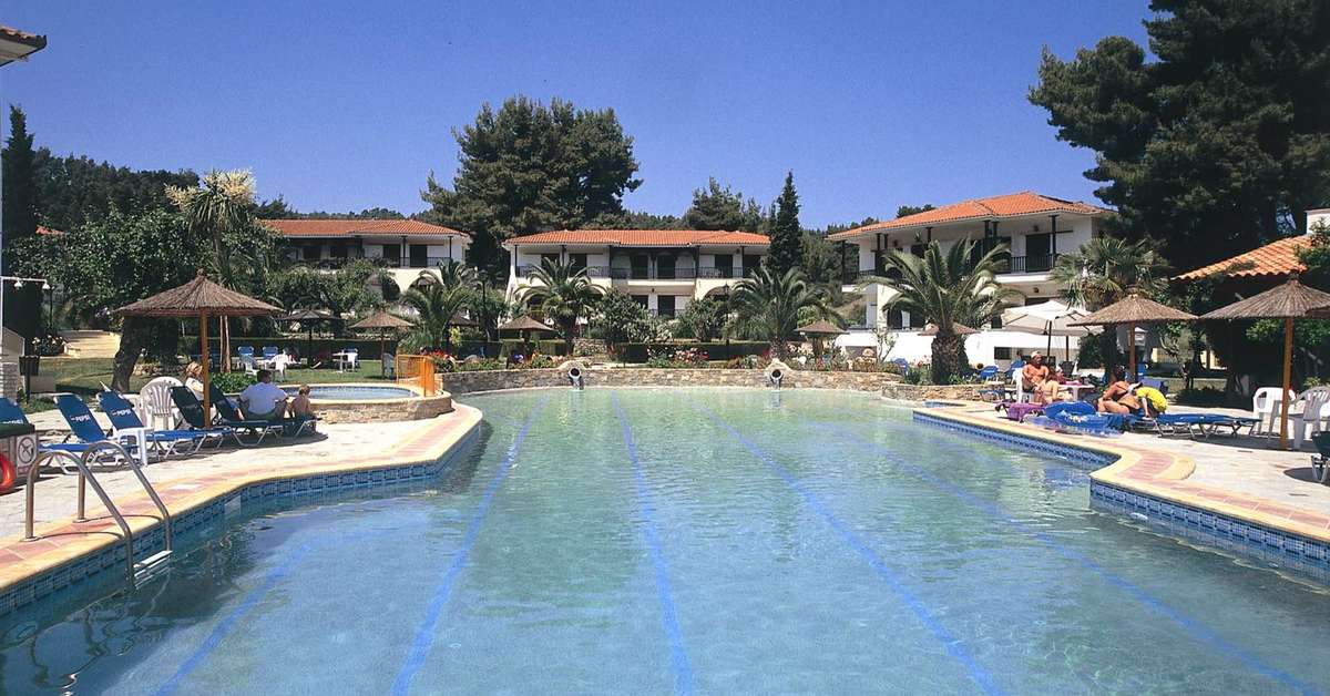 Een foto van het zwembad bij Chrousso Village Hotel