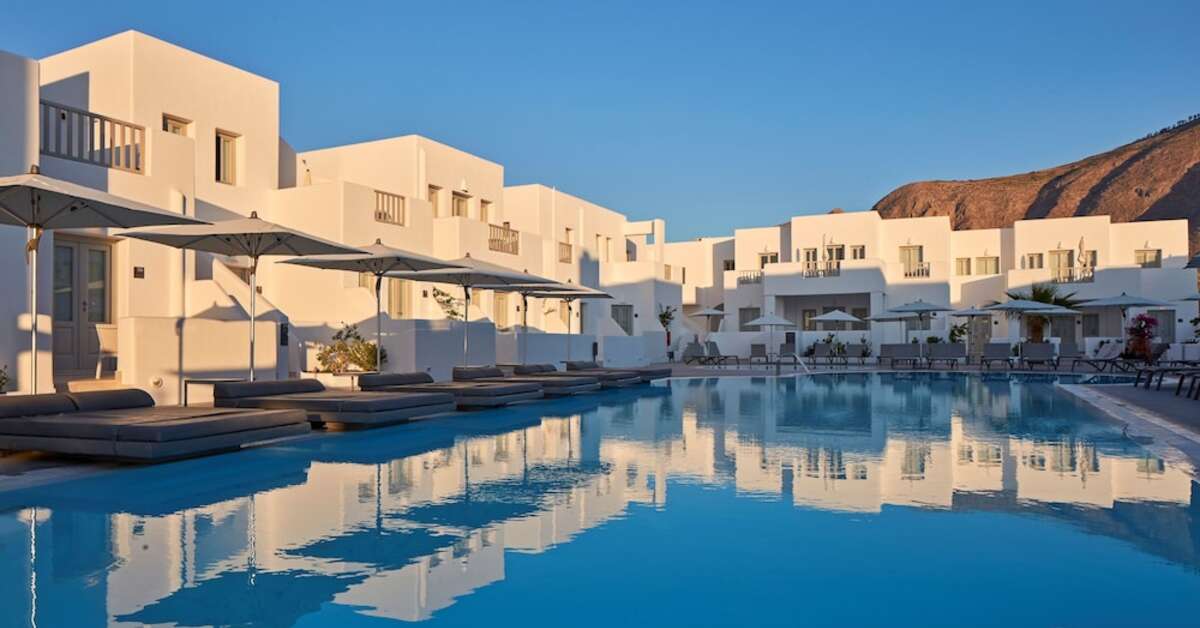 Een foto van het zwembad bij Aqua Blue Hotel