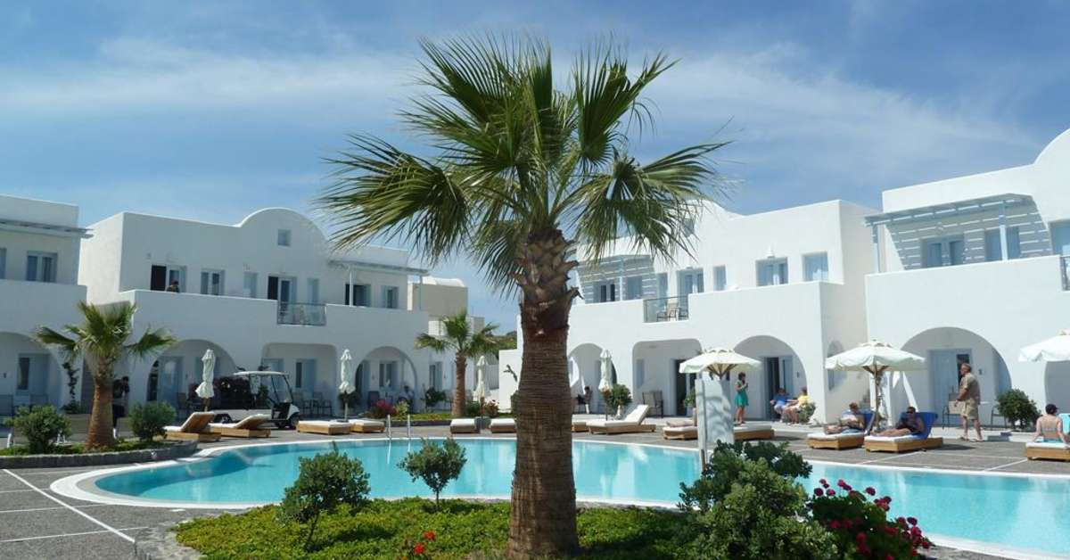 Een foto van het zwembad bij El Greco Resort & Spa
