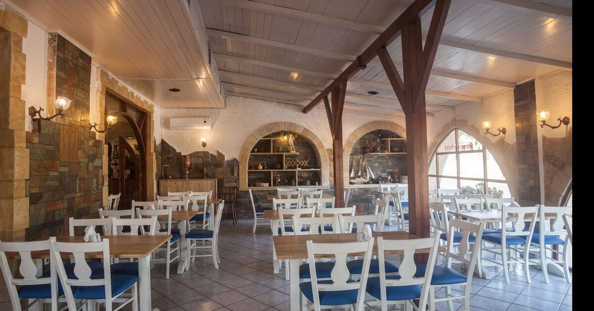 Ein Foto Evina Rooms & Villas