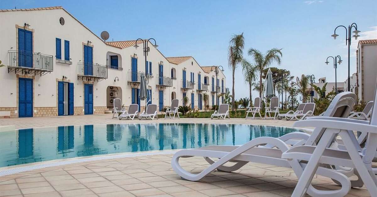 Een foto van het zwembad bij Scala dei Turchi Resort