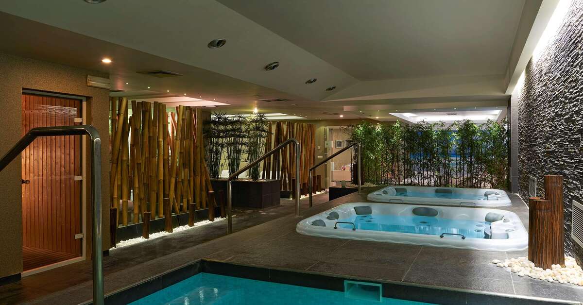 Een foto van het zwembad bij Melia Madeira Mare