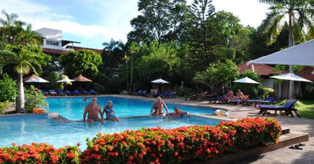 Een foto van het zwembad bij Sunshine Garden Resort