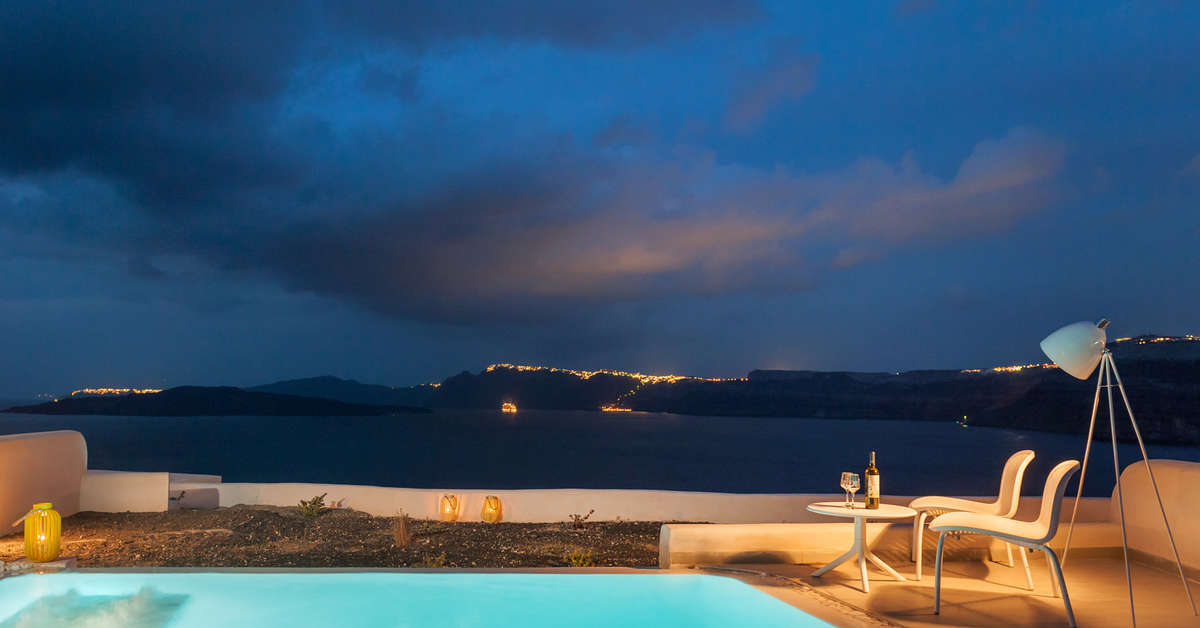 Een foto van het zwembad bij Neptune Luxury Spa Suites