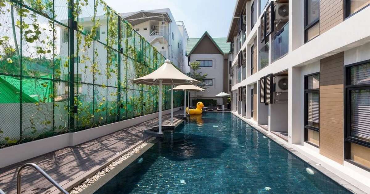 Ein Foto Outrigger Surin Beach Resort