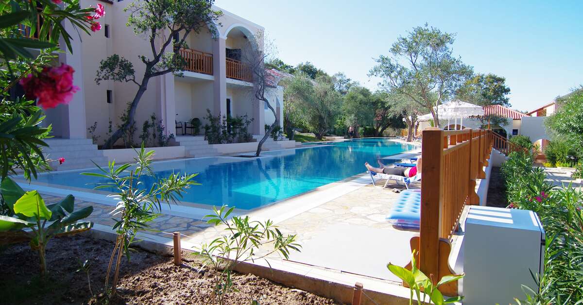 Een foto van het zwembad bij Roda Beach Resort & Spa