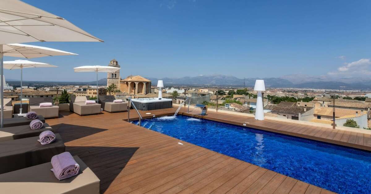 Ein Foto vom Pool im Zafiro Can Ribera Boutique