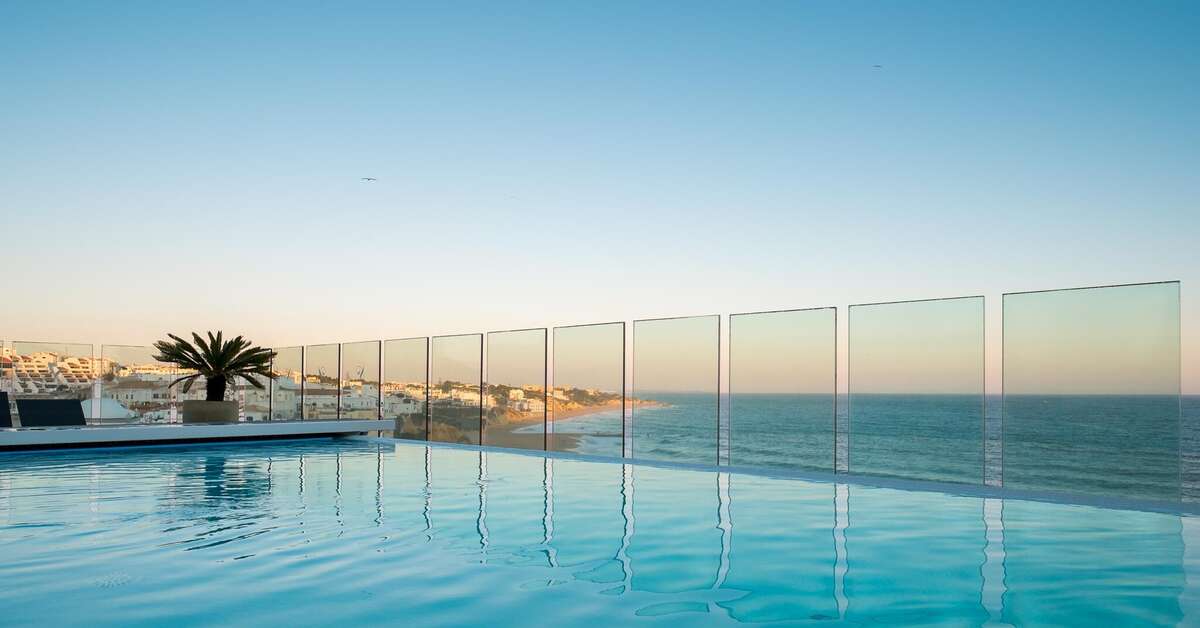 Een foto van het zwembad bij Rocamar Exclusive Hotel & Spa