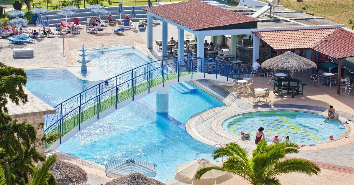 Een foto van het zwembad bij Corali Hotel & Village
