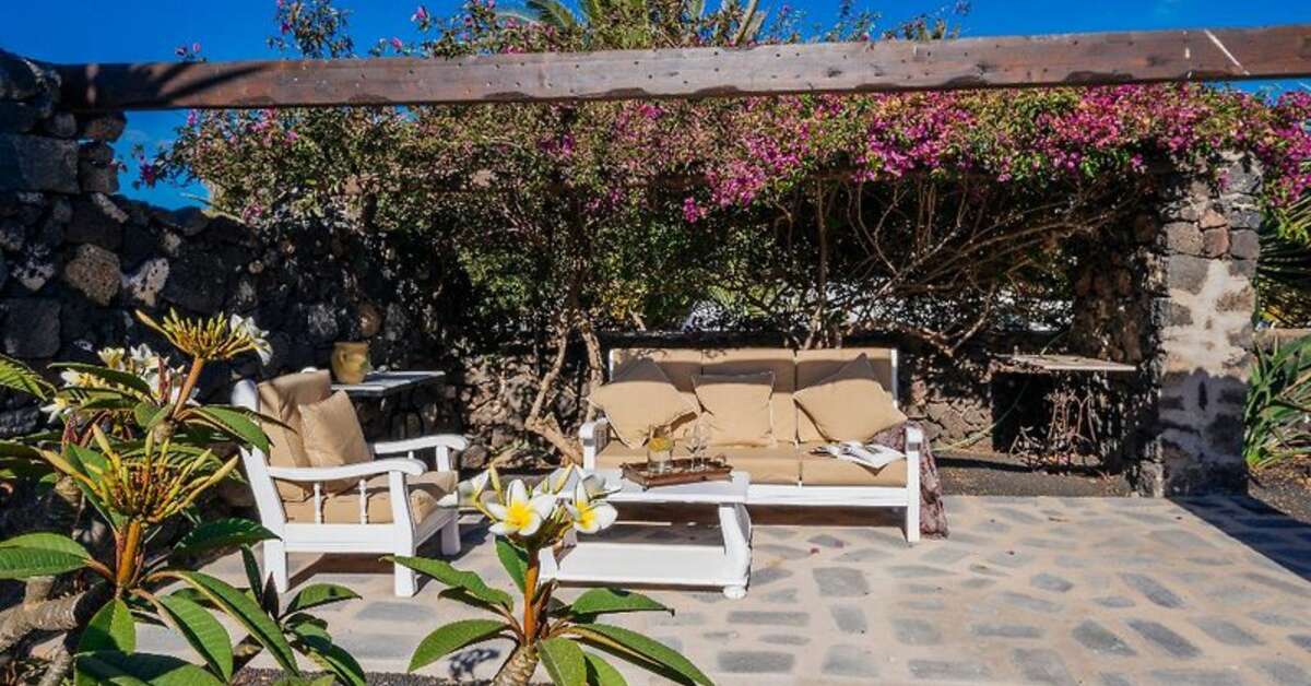 Een foto van het terras bij Hotel El Grifo