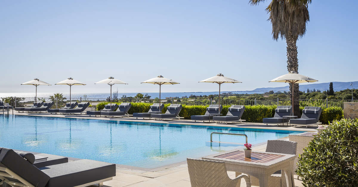 Een foto van het zwembad bij Astra Village Hotel & Spa