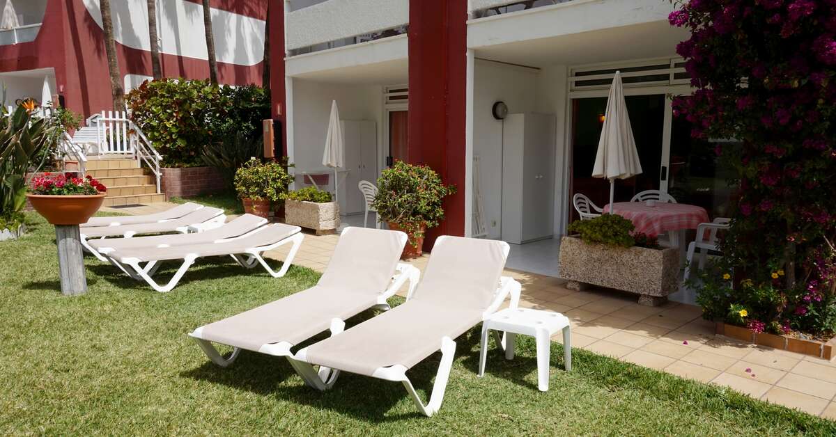 Een foto van het terras bij Appartementen Ecuador
