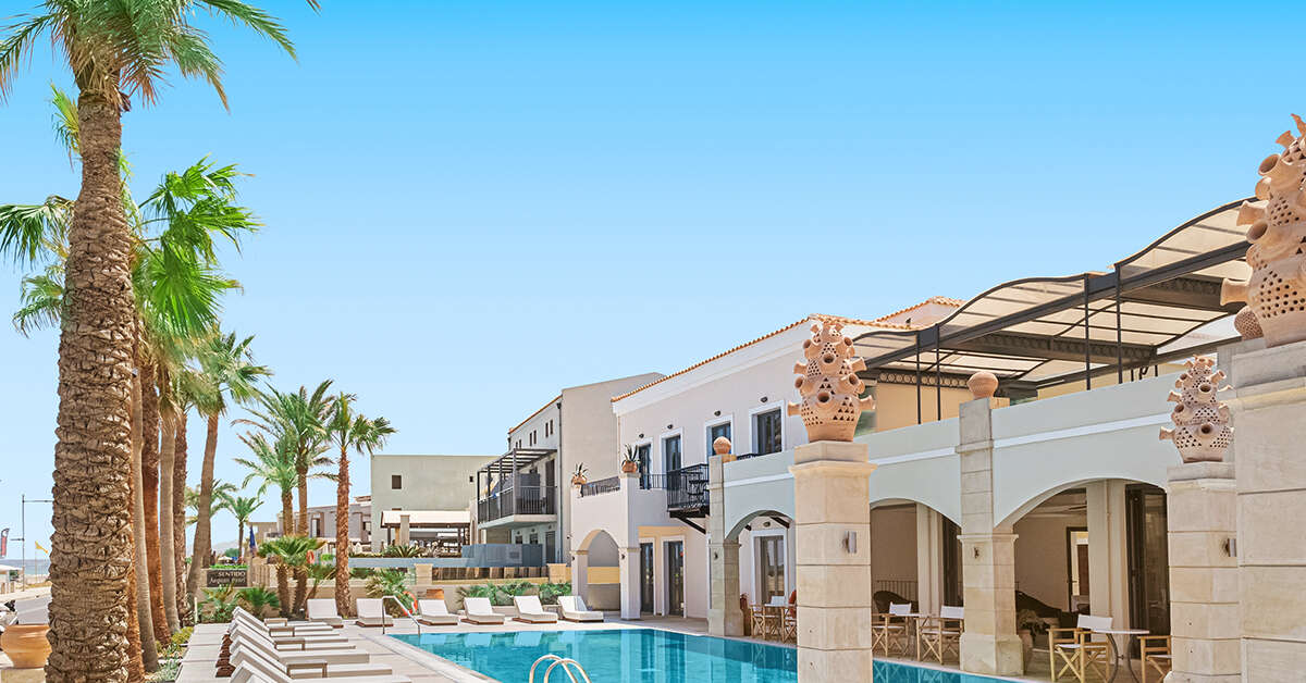 Ein Foto vom Pool im Grecotel Plaza Beach House