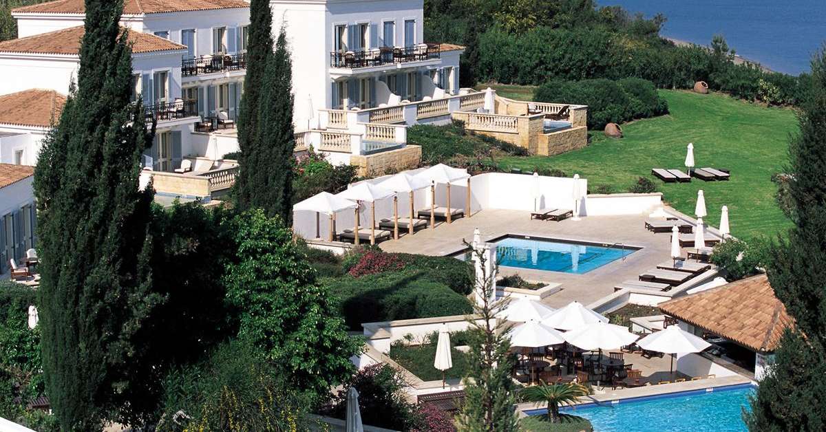 Een foto van het zwembad bij Anassa Hotel