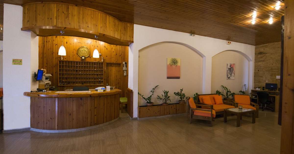 Een foto van het interieur van International Hotel
