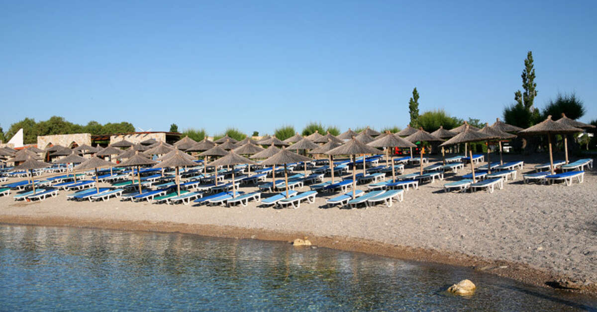 Een foto van het strand bij Eden Roc Resort Hotel