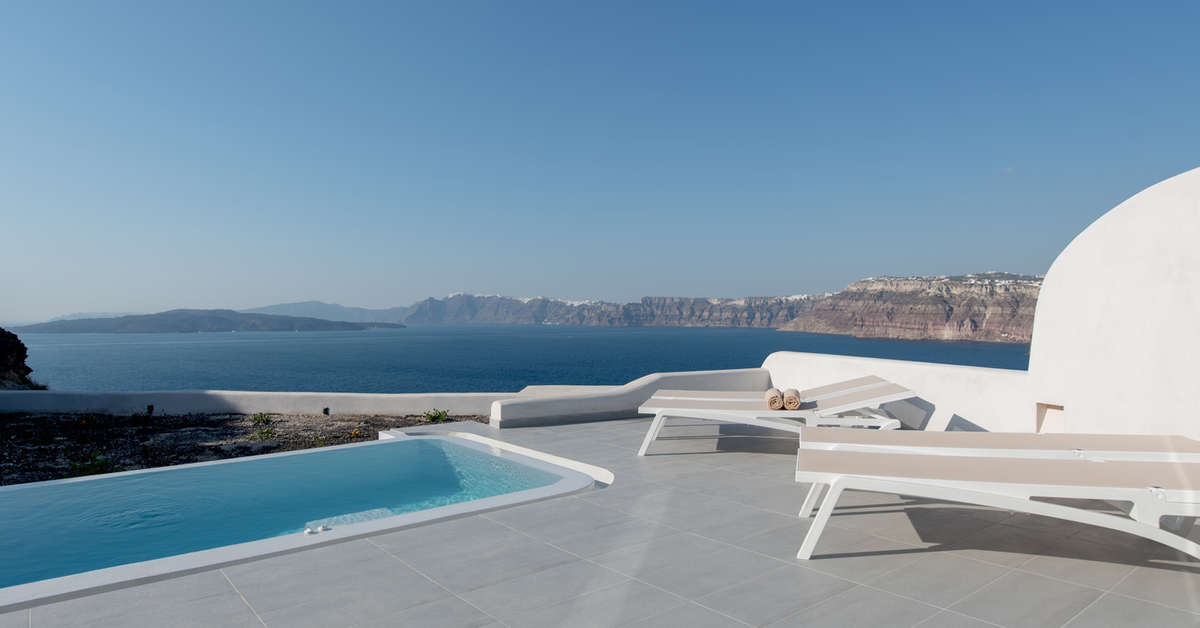 Een foto van het zwembad bij Neptune Luxury Spa Suites