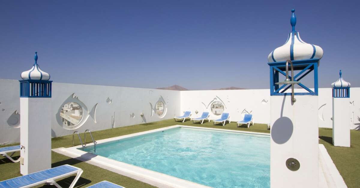 Een foto van het zwembad bij Hotel Lancelot