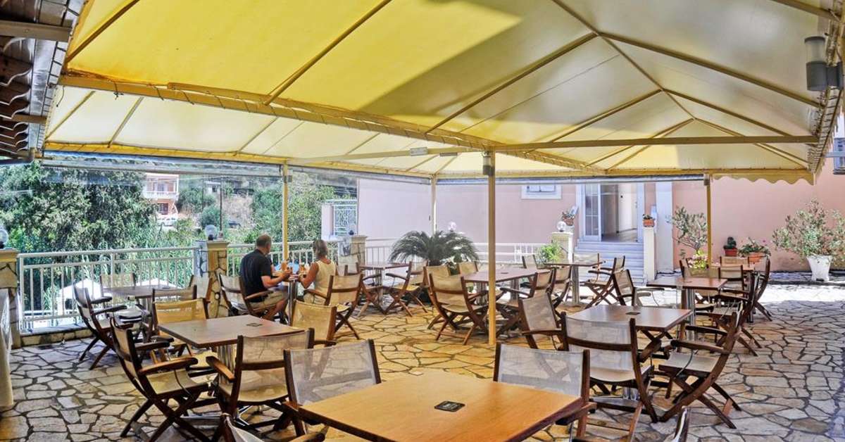 Een foto van het terras bij Aparthotel Angelica