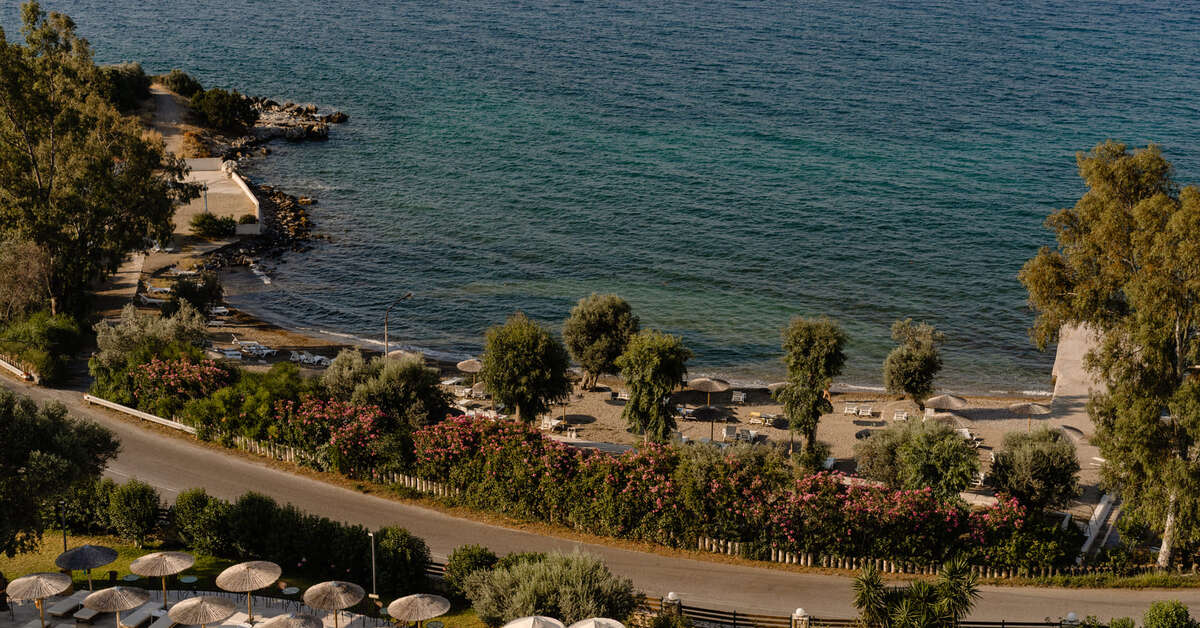 Een foto van het strand bij Evia Riviera Resort