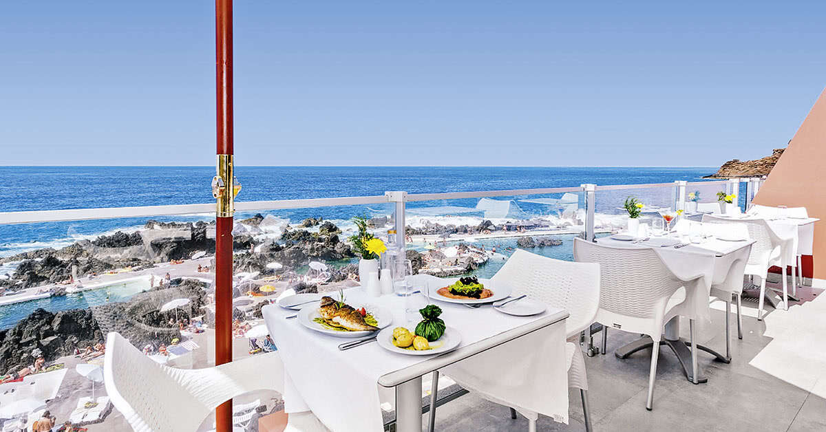 Een foto van het terras bij Aqua Natura Madeira Hotel
