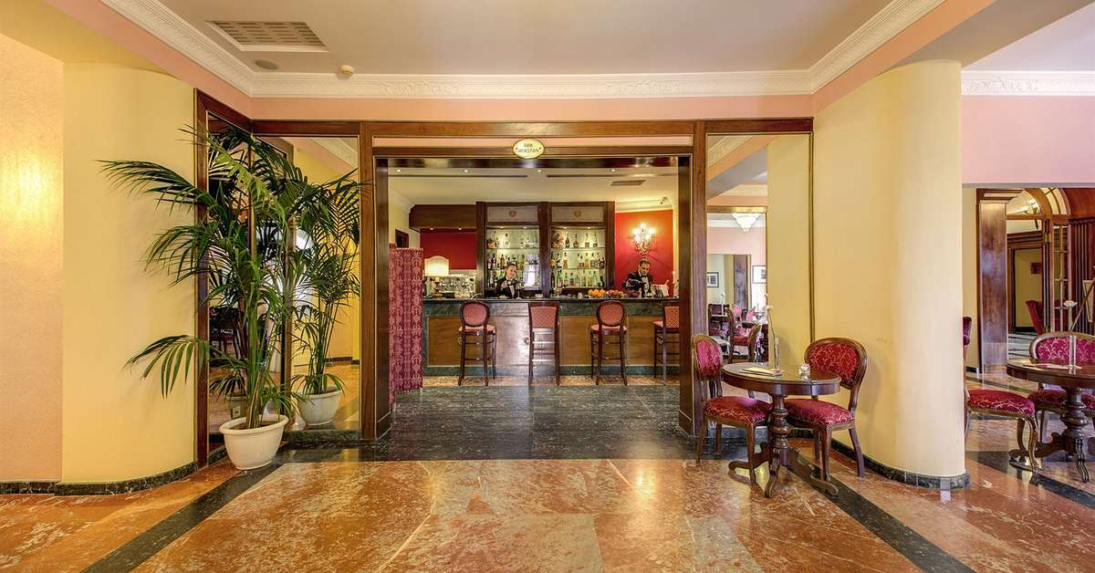 Een foto van het interieur van Grand Hotel Villa Politi