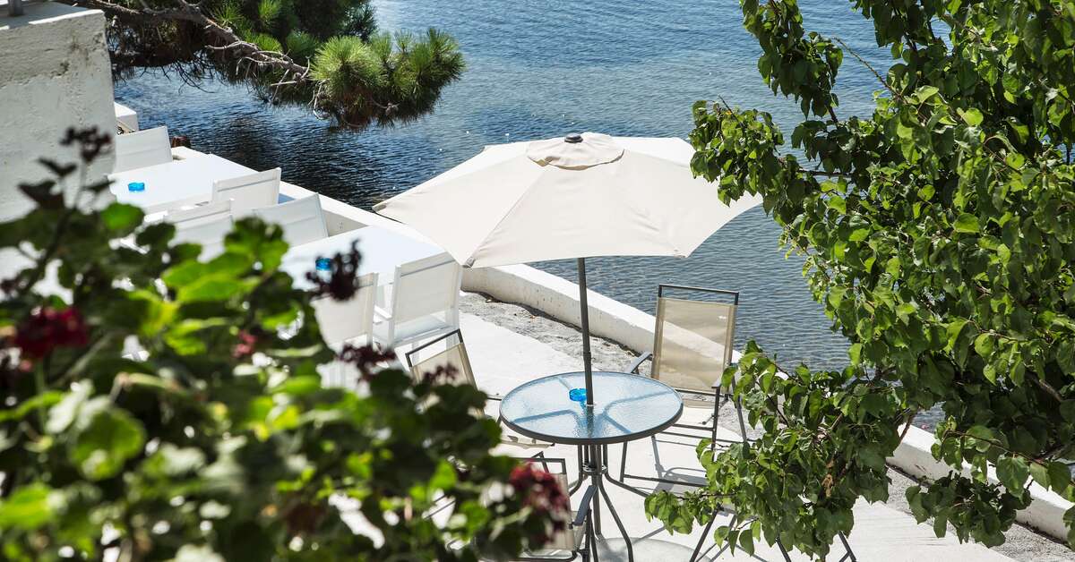 Een foto van het terras bij Porto Evia Boutique Hotel