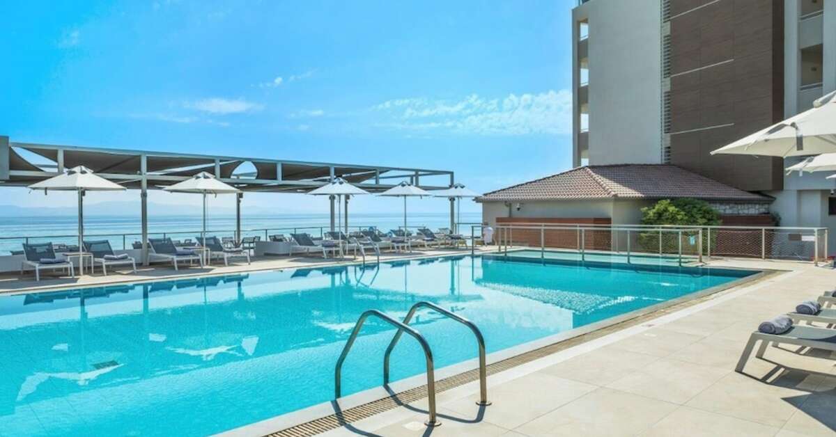 Een foto van het zwembad bij Ammon Zeus Hotel