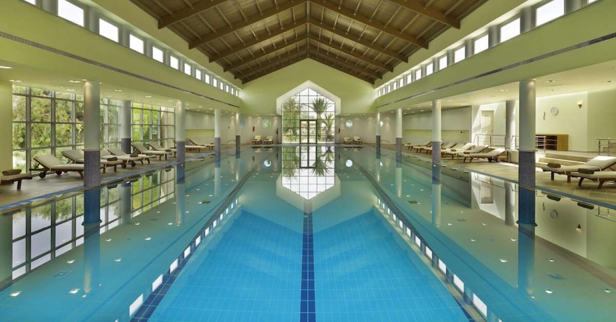 Een foto van het zwembad bij Neptune Luxury Resort