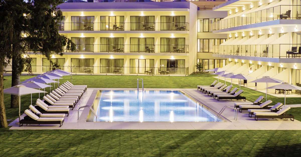 Een foto van het zwembad bij Vila Gale Collection Palacio dos Arcos